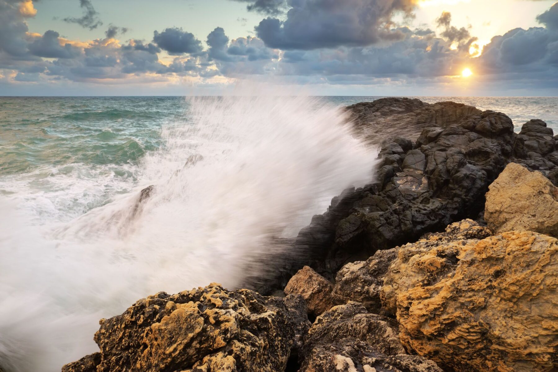 Calming Transformations Counseling - Waves hitting rocks in the ocean - anxiety therapy