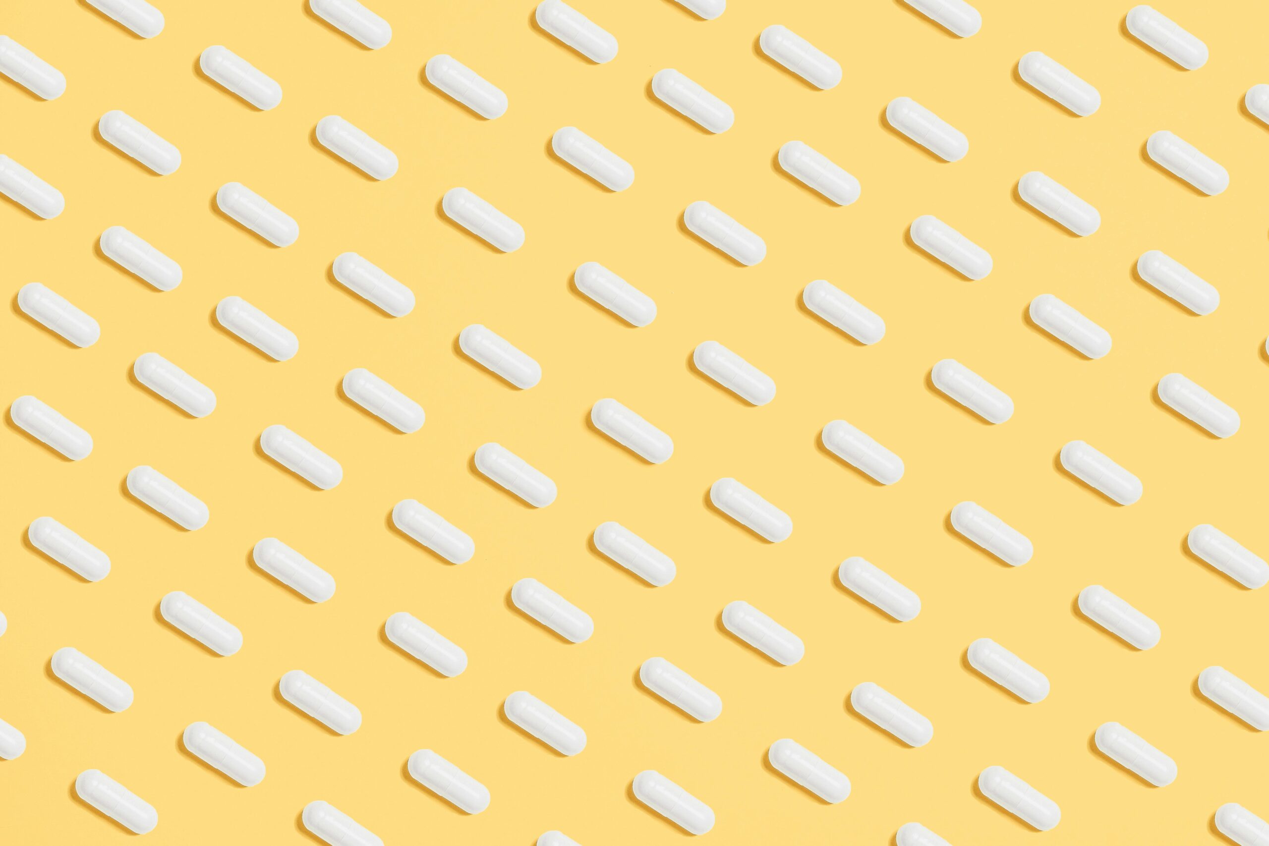 Medication on a yellow background