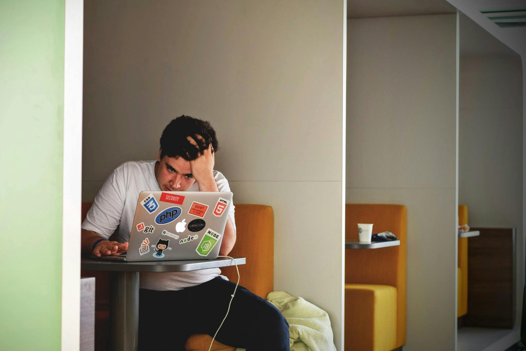 Anxious man looking at computer